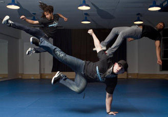 photograph of break dancers in action